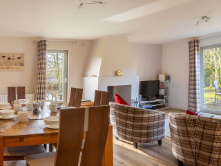 Courtyard Cottage 8 The living room in Taigh Nan Caorach at Abbey Holidays Loch Ness