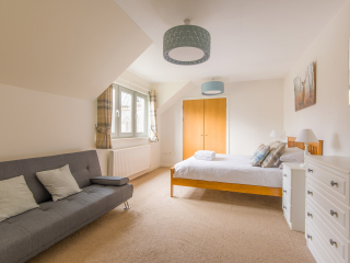 Courtyard Cottage 4 Bedroom A double room in the Brora accommodation at Abbey Holidays Loch Ness