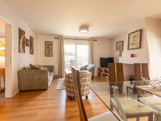 Courtyard Cottage 4 Living Room The living room in the Brora accommodation at Abbey Holidays Loch Ness