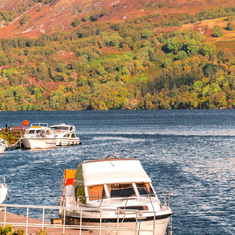 Boats docked at south west part of Loch Ness lwhere it meets Caledonian Canal at Fort Augustus