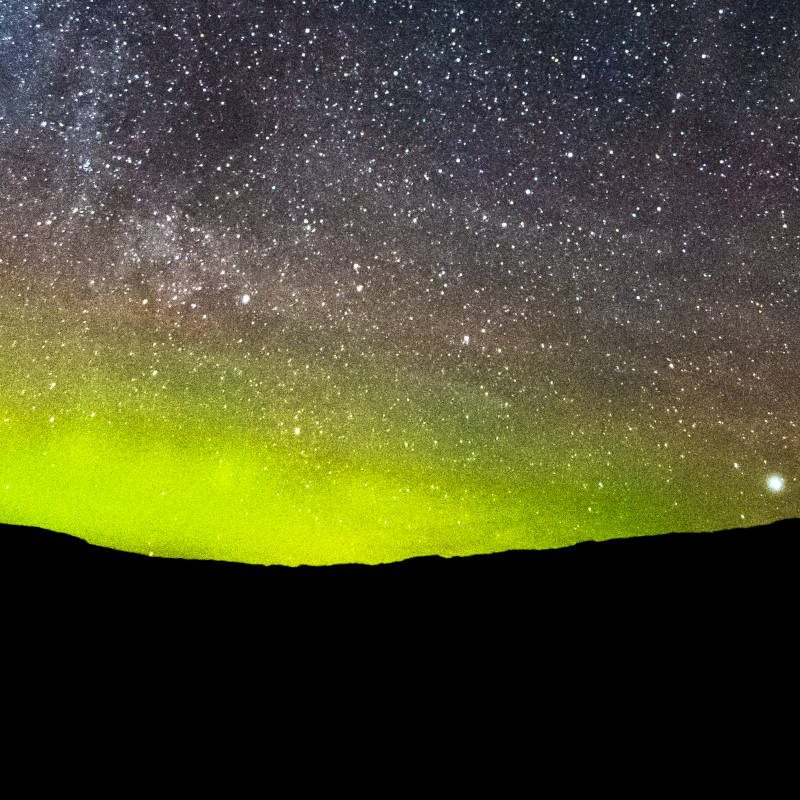 The Aurora Borealis over the Scottish Highlands