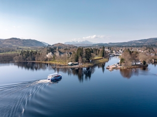 A Nessie boat tour returning to Fort Augustus