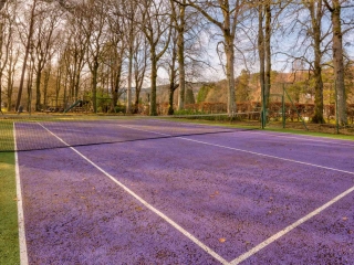 The outdoor tennis court at abbey holidays on loch ness.