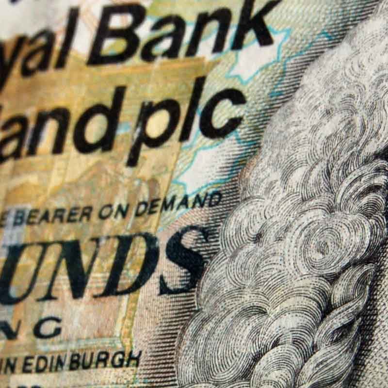 A close up of a Royal Bank of Scotland five pound note.