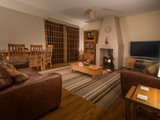 Cottage 2, Fort Augustus Abbey, February 2024 Self Catering Cottage 2. Dog friendly cottage image of the lounge and dining room.