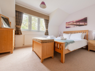 Cottage 2, Fort Augustus Abbey, February 2024 Double bedroom within cottage 2 on Loch Ness.