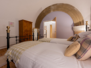 Abbey Church 24 Upper North Aisle Twin Room 3 Abbey Church 24 - Upper North Aisle accommodations stunning twin bedroom kitchen at Abbey Holidays by Loch Ness