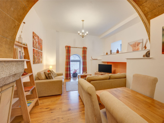 Abbey Church 25 - The Dunfermline accommodations dining and living room at Abbey Holidays by Loch Ness