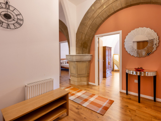 Abbey Church 25 - The Dunfermline accommodations hallway with stunning stone arch at Abbey Holidays by Loch Ness