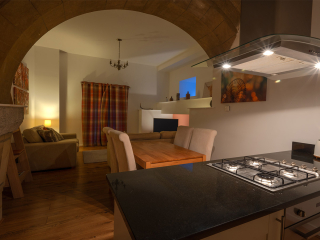 Abbey Church 25 - The Dunfermline accommodations kitchen, dining and living room with stunning stone arch at Abbey Holidays by Loch Ness