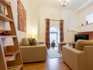 Abbey Church 25 - The Dunfermline accommodations living room at Abbey Holidays by Loch Ness