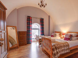 Abbey Church 25 - The Dunfermline accommodations arched twin bedroom at Abbey Holidays by Loch Ness
