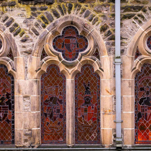 Brothers Wing 7 - Cannon Point accommodations exterior beautiful arched church windows at Abbey Holidays Loch Ness