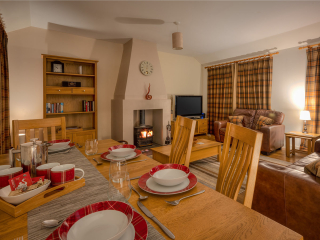 Courtyard Cottage 2 Club Cottage open plan living dining room at Abbey Holidays by Loch Ness
