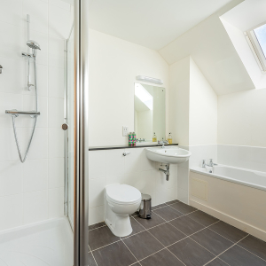 Courtyard Cottage 4 - Brora accomodation&#039;s bathroom with separate shower and bath at Abbey Holidays Loch Ness