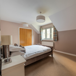 Strath Glass accommodation&#039;s double bedroom at Abbey Holidays Loch Ness