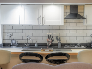 Strath Glass accommodation&#039;s kitchen and dining area at Abbey Holidays Loch Ness
