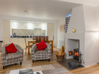 Courtyard Cottage 8 - Taigh Nan Caorach accommodation&#039;s open plan living at Abbey Holidays Loch Ness