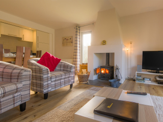 Courtyard Cottage 8 - Taigh Nan Caorach accommodation&#039;s open plan living at Abbey Holidays Loch Ness