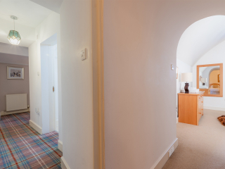 Moat House 2 - Major&#039;s Apartment accommodation&#039;s hallway at Abbey Hoildays Loch Ness