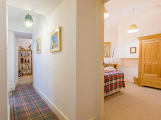 Moat House 2 - Major&#039;s Apartment accommodation&#039;s hallway at Abbey Hoildays Loch Ness