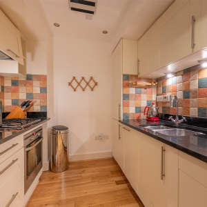 Moat House 2 - Major&#039;s Apartment accommodation&#039;s kitchen at Abbey Hoildays Loch Ness