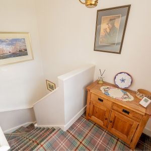 Moat House 2 - Major&#039;s Apartment accommodation&#039;s landing and stairs at Abbey Hoildays Loch Ness