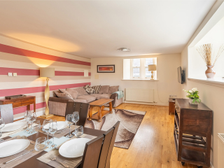 Monastery 10 - Brunel accommodation&#039;s open plan living and dining at Abbey Holidays Loch Ness