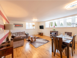 Monastery 10 - Brunel accommodation&#039;s open plan living and dining at Abbey Holidays Loch Ness