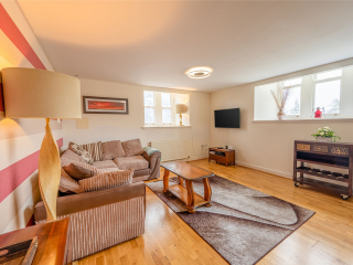 Monastery 10 - Brunel accommodation&#039;s open plan living and dining at Abbey Holidays Loch Ness