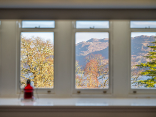 Monastery 10 - Brunel accommodation&#039;s view of Loch Ness from the living room window at Abbey Holidays Loch Ness