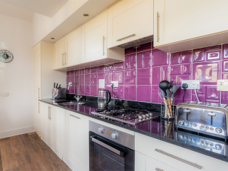 The Caledonian - Old School 12 accommodation&#039;s kitchen at Abbey Holidays Loch Ness