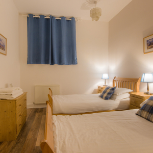 The Caledonian - Old School 12 accommodation&#039;s twin bedroom at Abbey Holidays Loch Ness