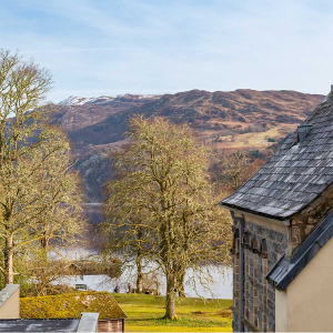 The Caledonian - Old School 12 accommodation&#039;s view of Loch Ness and the hills at Abbey Holidays Loch Ness