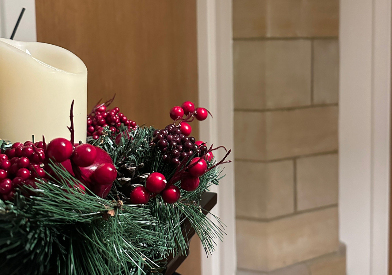 A festive candle in the abbey apartment